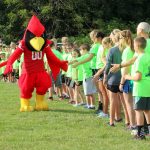 The groundbreaking came at the beginning of Corpus Christi's annual track-a-thon, which raised nearly $30,000 for the school this year. Among the special guests was Reggie Redbird, the mascot of Illinois State University. (The Catholic Post/Jennifer Willems)