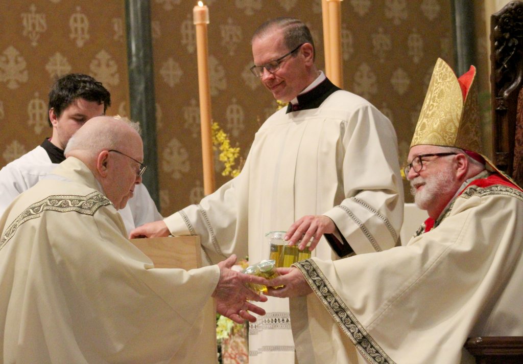 The Catholic Post Priests renew promises as sacramental oils are ...