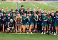 Peoria Notre Dame soccer players and coaches pose with the IHSA Class 2A boys trophy they earned with a 3-1 win over Chatham Glenwood to cap a 23-3-1 season. The title match was played at Hoffman Estates High School on Nov. 5. (Provided photo/Cindy Dermody)