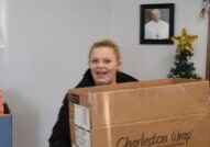 Maggie Abrams of Peoria, single mother of six, said of the Catholic Charities Christmas gift distribution: “We feel blessed.” (The Catholic Post Online/ Paul Thomas Moore)