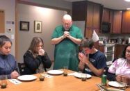 Father Dominic Garramone – “The Bread Monk” prays before breaking bread with visiting members of the National Evangelization Team (NET) and Saint Bede Academy students at St. Bede Abbey’s Bethany House. (Supplied photo)